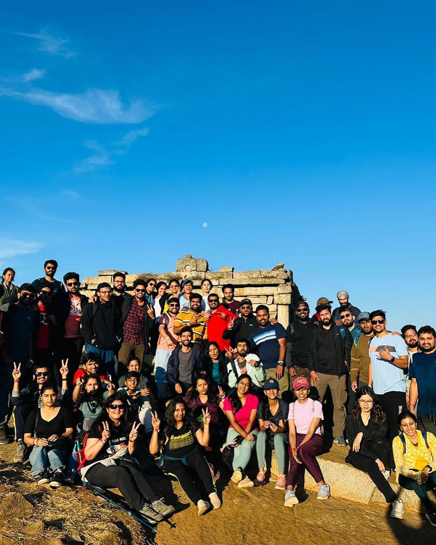 Hikers Horizon trekking group witnessing morning glow at Skandagiri